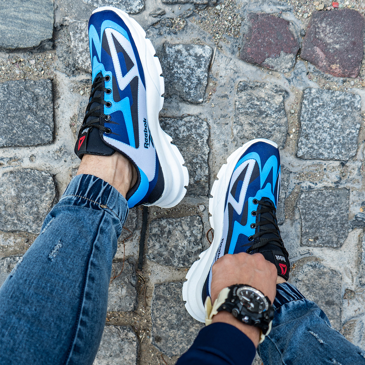 کفش ورزشی ریبوک آبی طوسی مردانه مدل Ervan