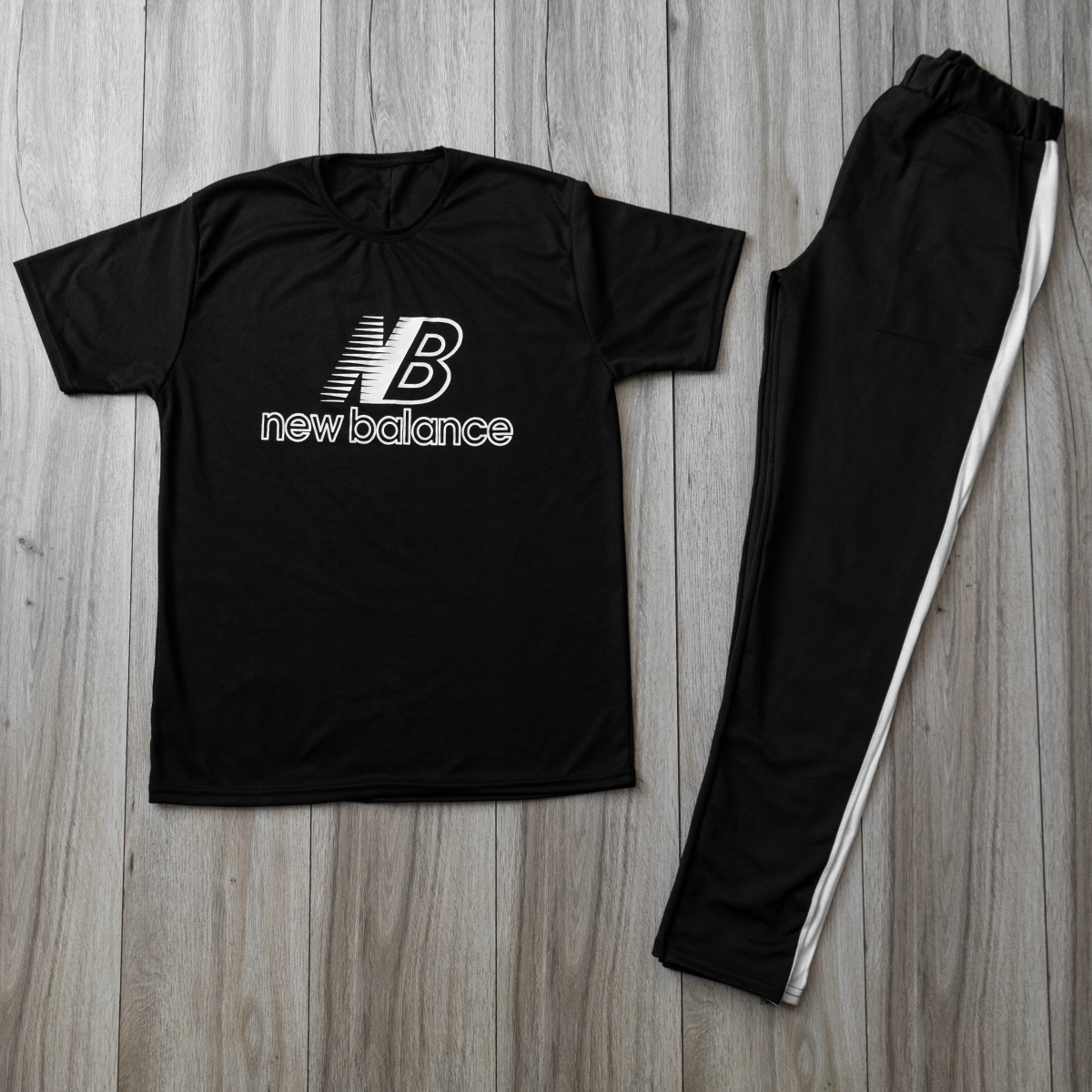 ست تیشرت شلوار مردانه New Balance مدل Malaga