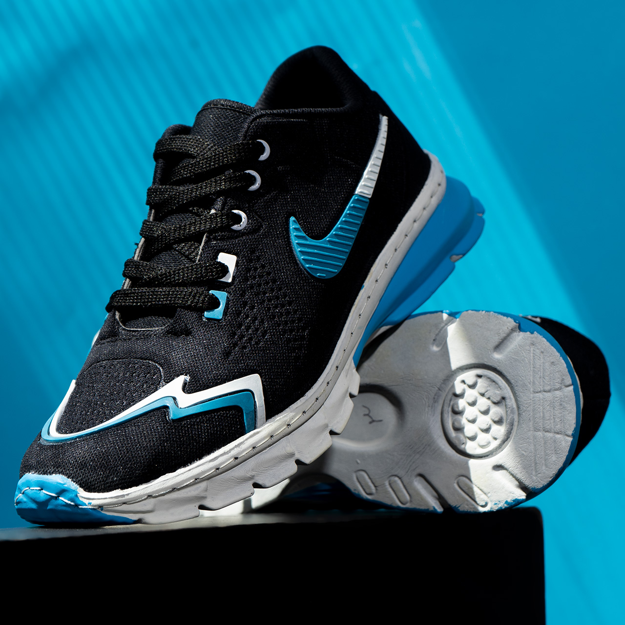 کفش نایک مشکی آبی خط دار مردانه مدل Sibon