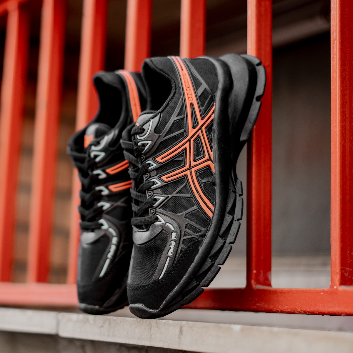 کفش ورزشی Asics زنانه مشکی نارنجی مدل Tina